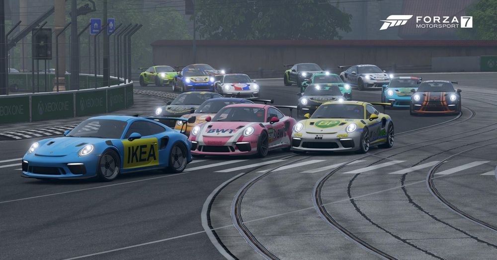 Racing Porsches round a corner in FM7.