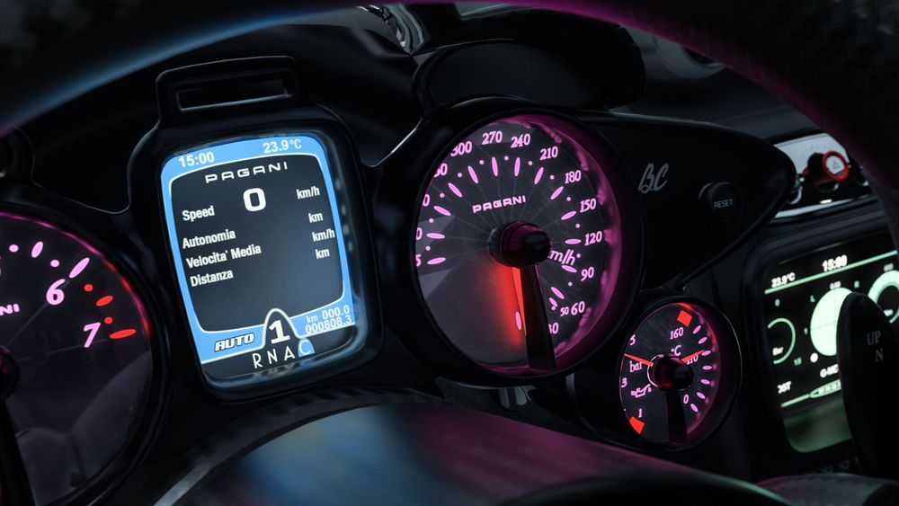 Gauges inside car illuminated in blue, red and pink hues.