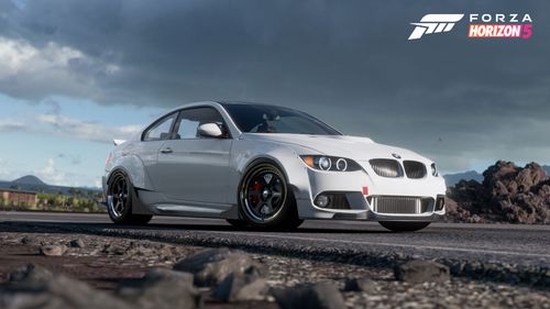 A white 2008 BMW M3 fitted with the StreetFighter LA body kit.