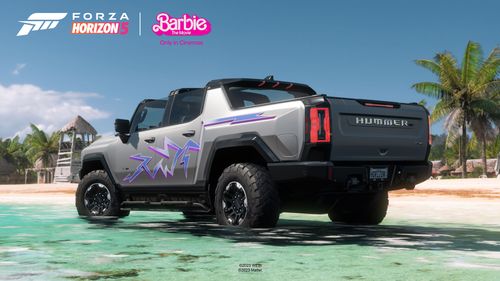 The Ken 2022 GMC HUMMER EV Pickup parked in the water by a beach.