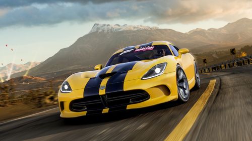 In a recreation of the original Forza Horizon cover art, the 2013 Dodge SRT Viper GTS Anniversary Edition drives through the arid farmland with a volcano in the backdrop.