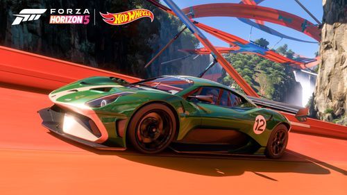 Brabham BT62 zooming down a Hot Wheels track.