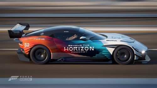 An Aston Martin Vulcan shows off a livery with words Beyond the Horizon Podcast, designed by user FormFirm.
