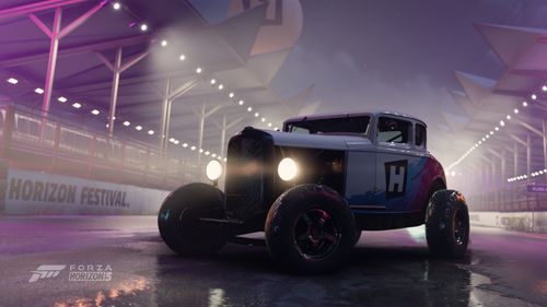 A 1932 Ford Forza Edition sits in the middle of a festively lit race course at night, photo by user ToriiDreww.