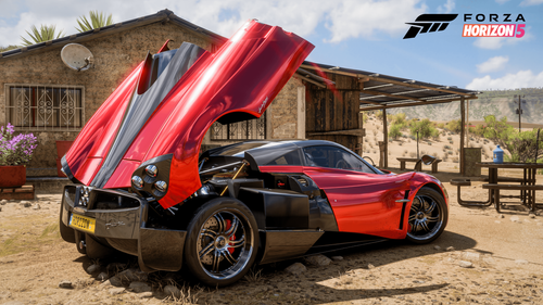 Pagany Huayra parked in a country road showing its engine