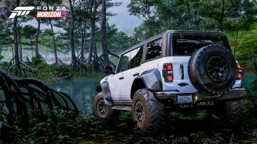A Ford Bronco Raptor cruising through a dark jungle