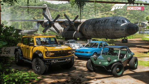 Four cars in the jungle parked in front of an old plane during the day