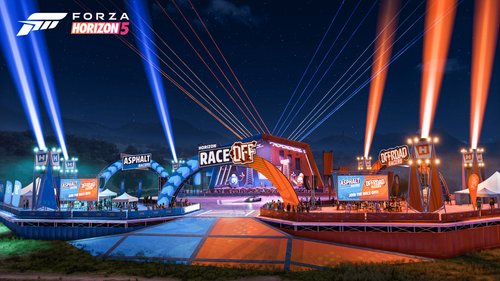 The new festival Outpost featuring both team's branding with shining spotlights at night