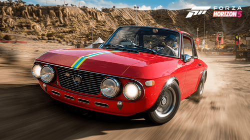 A Fulvia taking a bend on a dirt road surrounded by mountains.