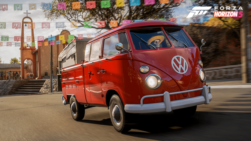 The VW Double Cab Pickup driving on a street decorated with colorful paper cut-out with different shapes